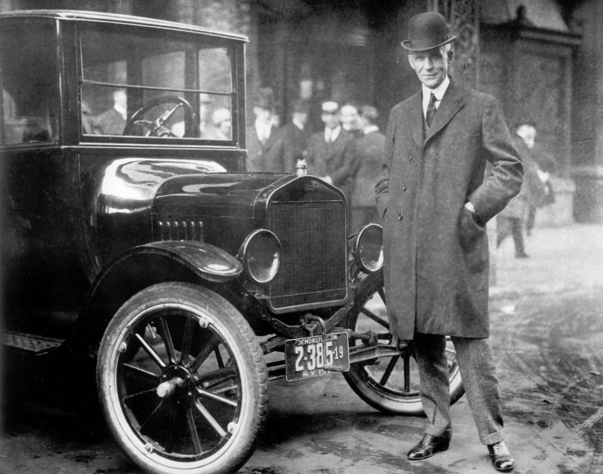 Henri Ford met zijn T-Ford
